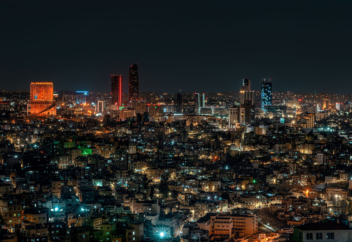 Amman at night, with the city lights spreading across its hills